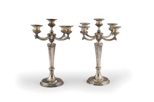 Pareja de candelabros de cinco luces en plata española Art